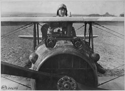 Eddie flying an old plane