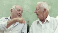Two men in conversation