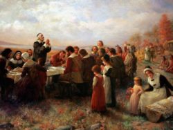 A classic artwork depicting a Thanksgiving dinner