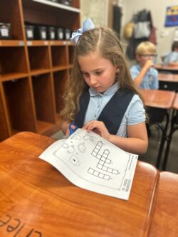 Girl cutting a paper